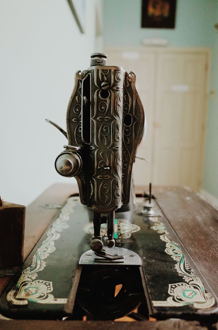 The Art of Drawing Readers In: Your attractive post title goes here Close-up of an ornate vintage sewing machine indoors in Ecuador.